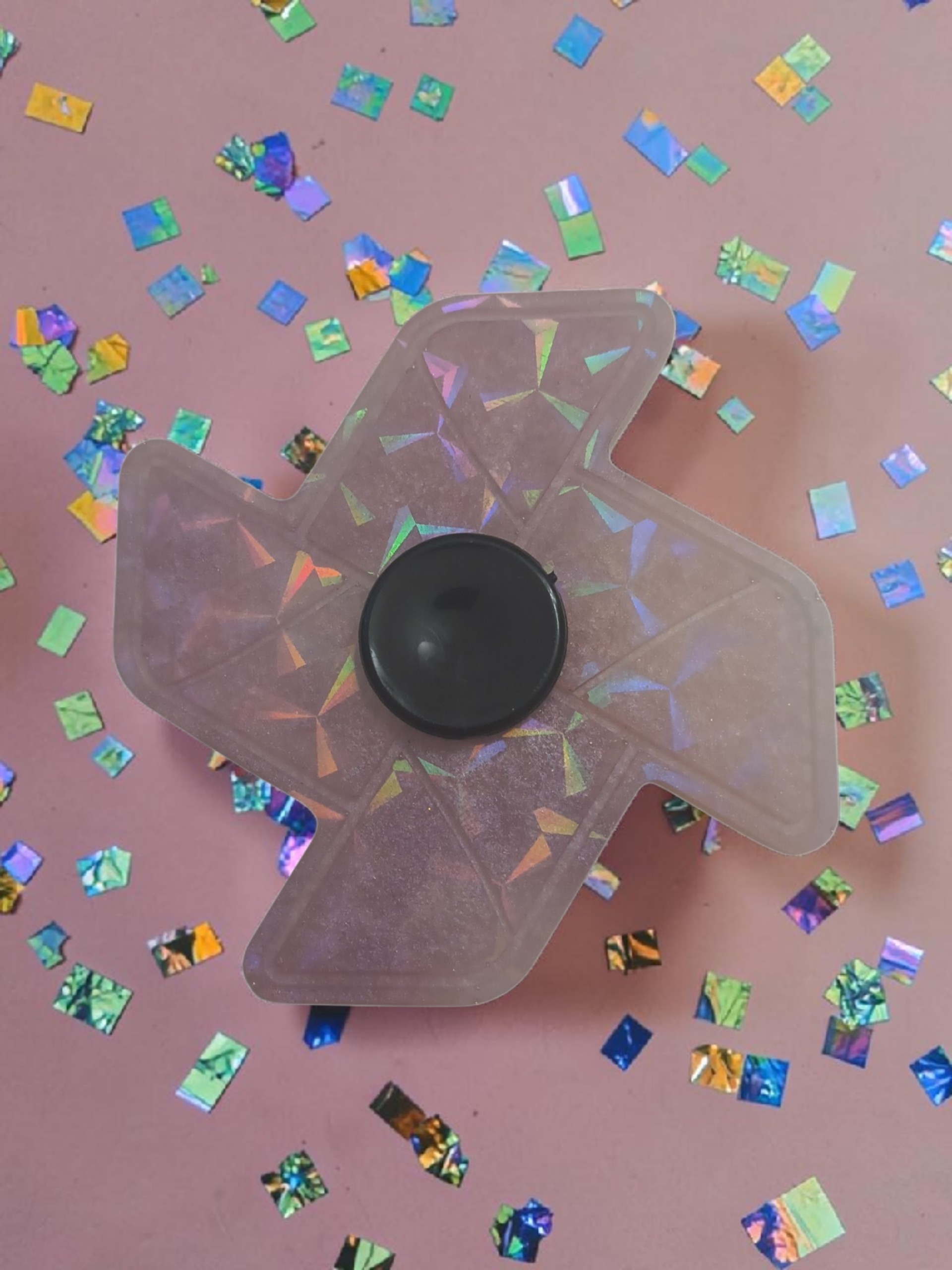 Pink holographic fidget spinner